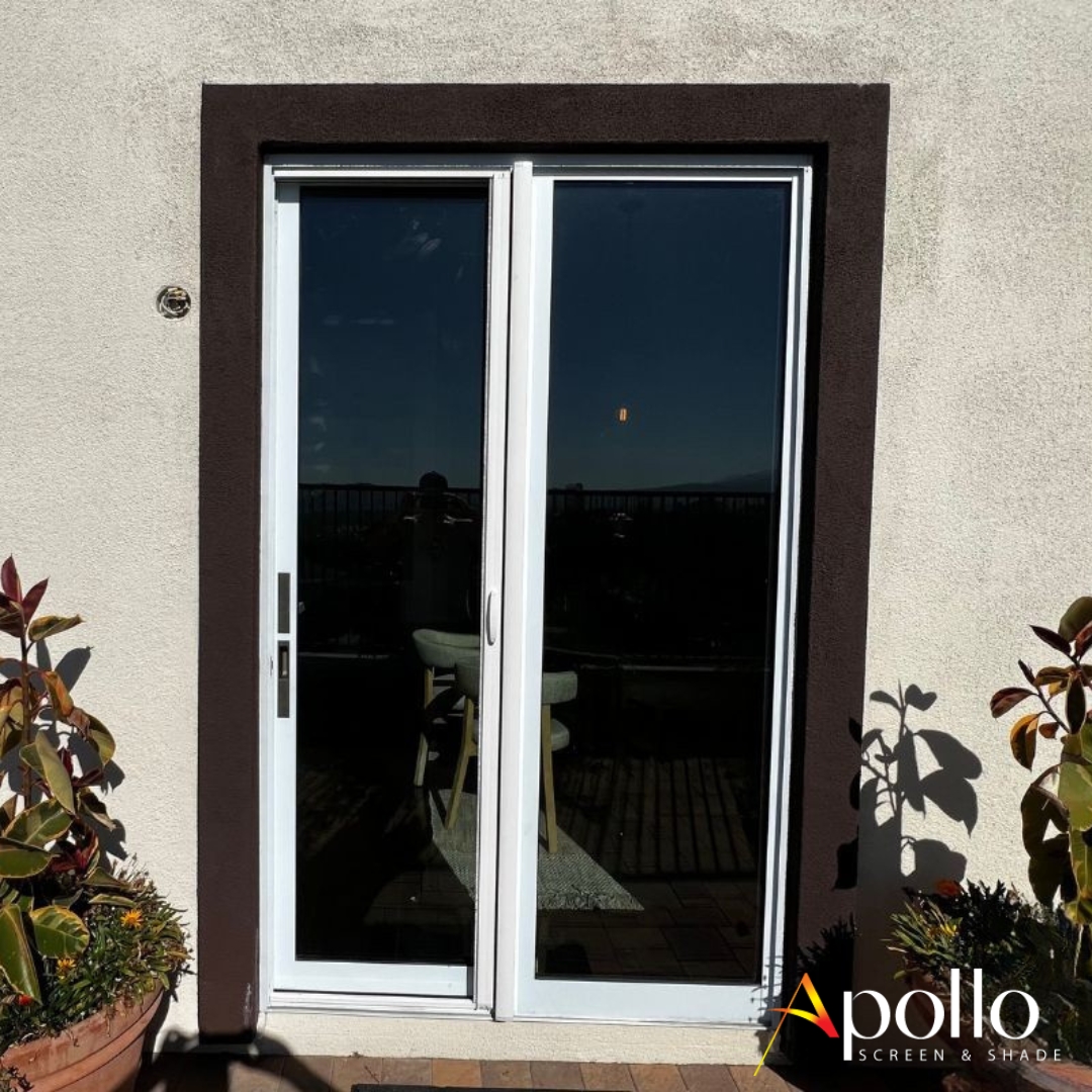 A Clean Look and Breezy Comfort with a White Retractable Screen Door.